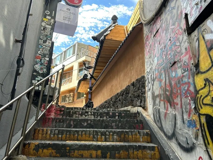 Anok above the stairs in a Hongdae alley