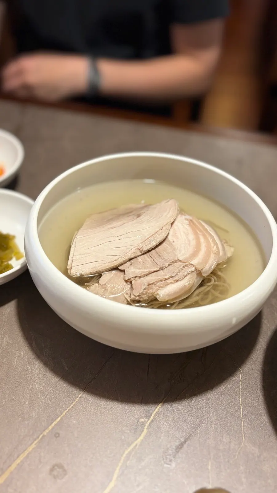 Clear pork gomtang piled high with meat