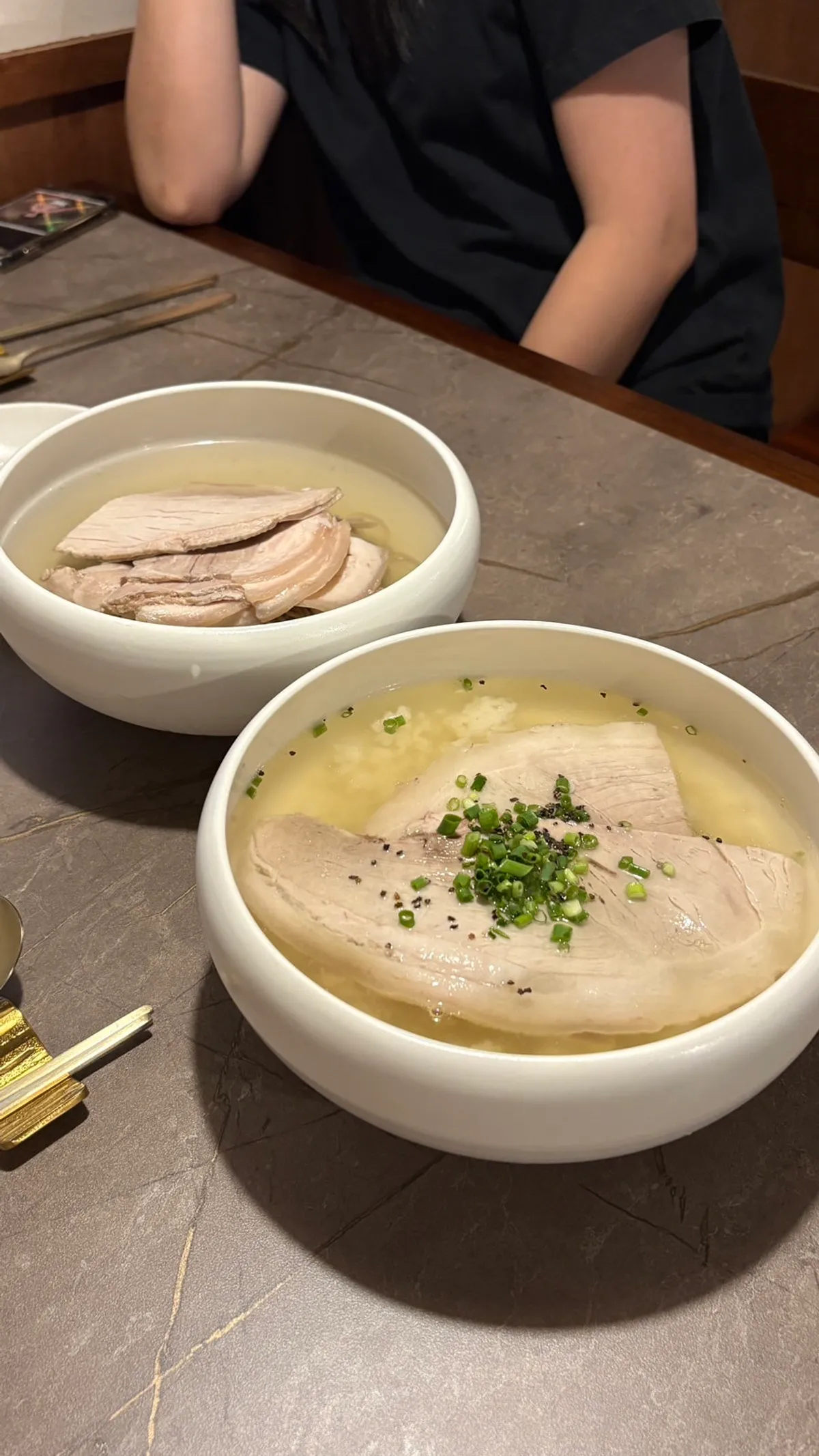 Pyongyang cold noodles topped generously with meat