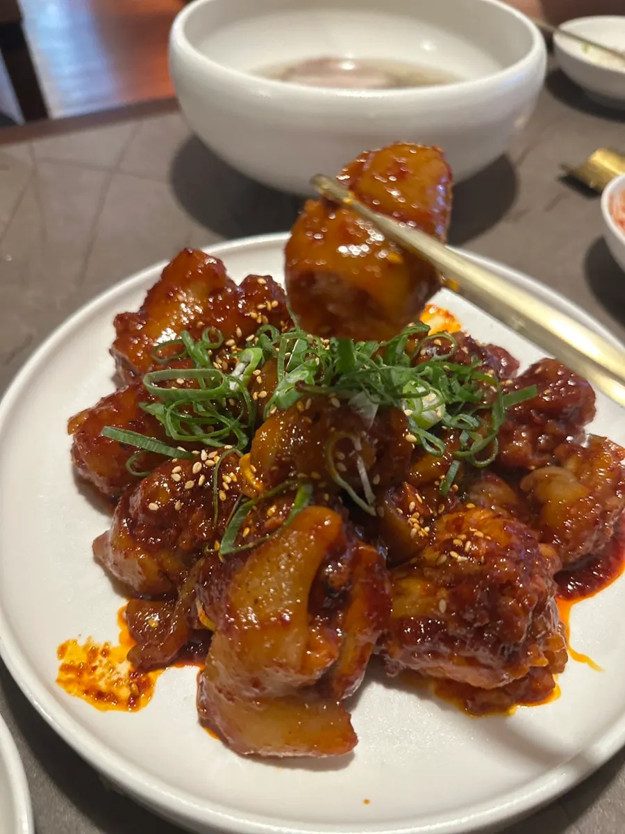 Braised pork tails served with the meal