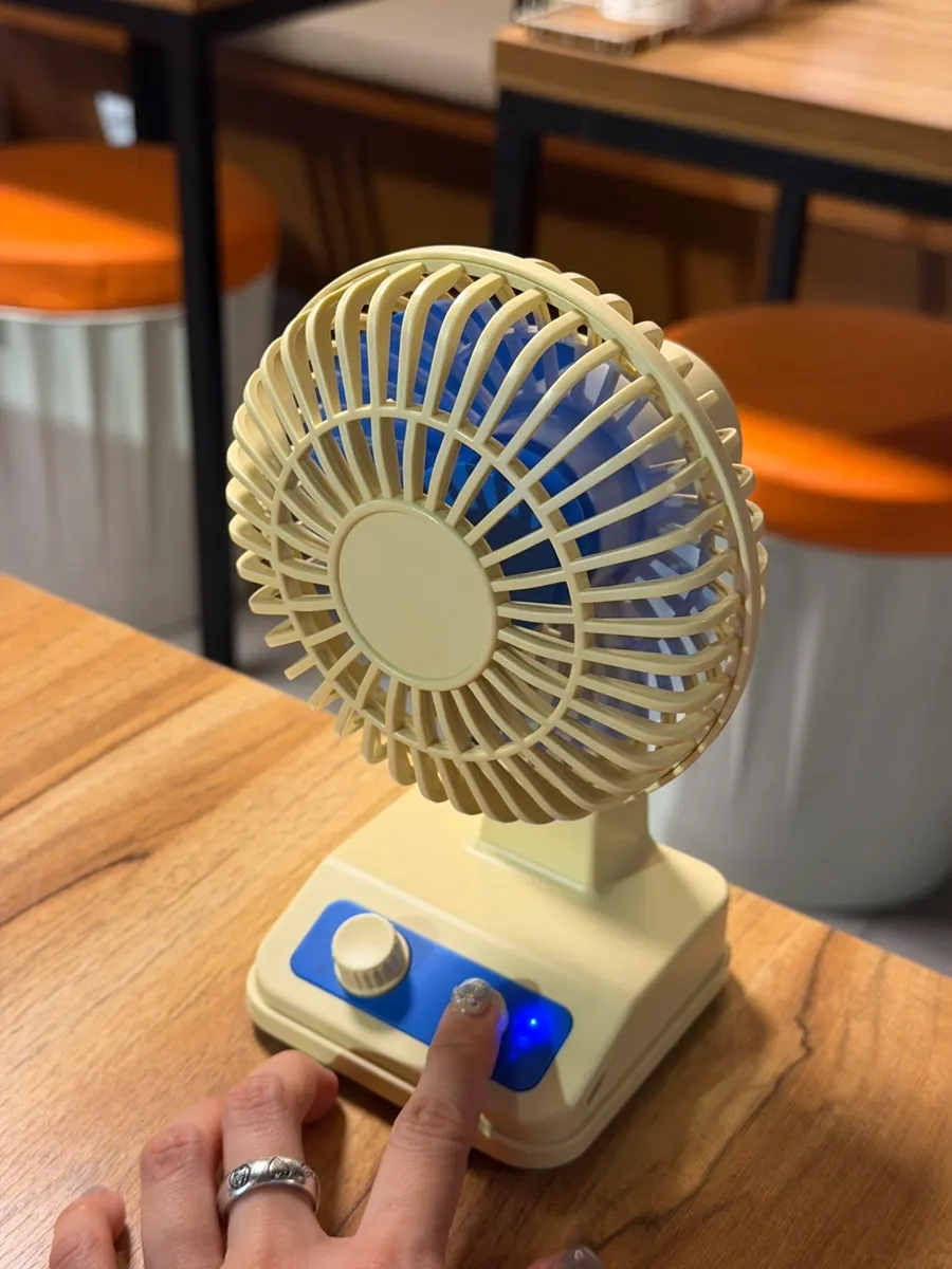 Analog-design desk fan placed on the table