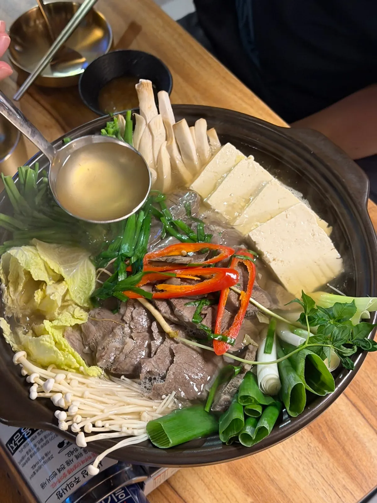 Steaming Korean beef hot pot at Baengni Gomtang