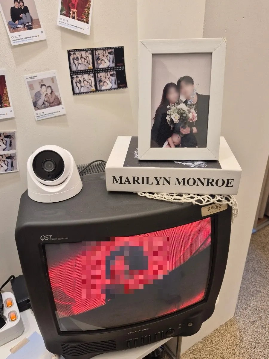Sample photos hanging on the waiting room wall