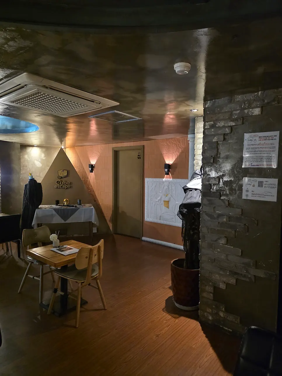 Dimly lit interior of the escape room café