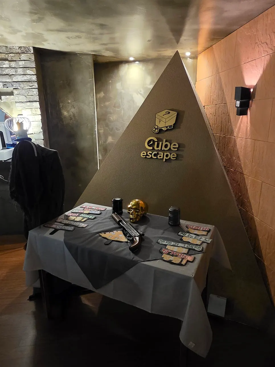 Photo zone props including a skull and toy gun
