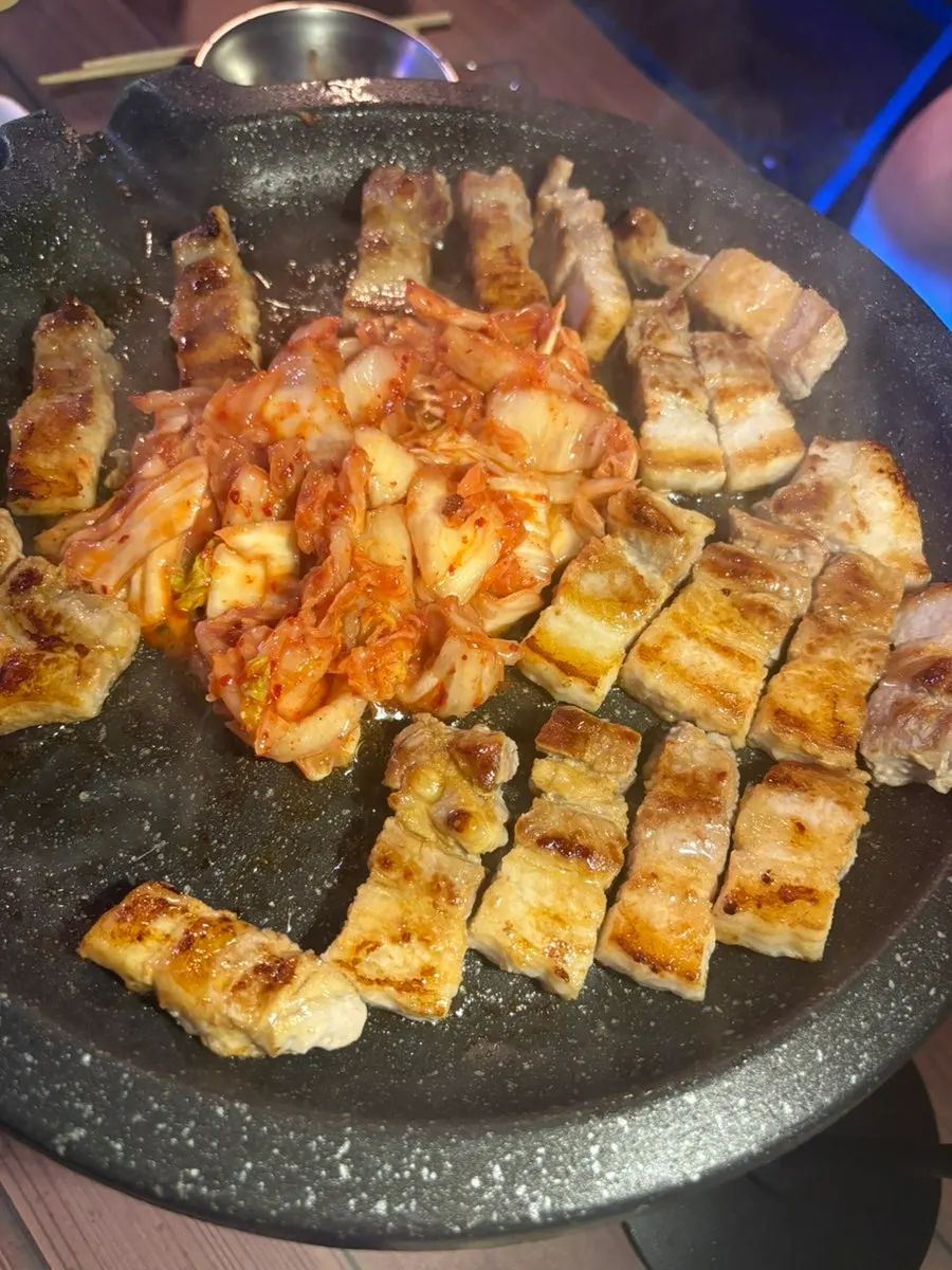 A full spread of japchaguri and pork belly