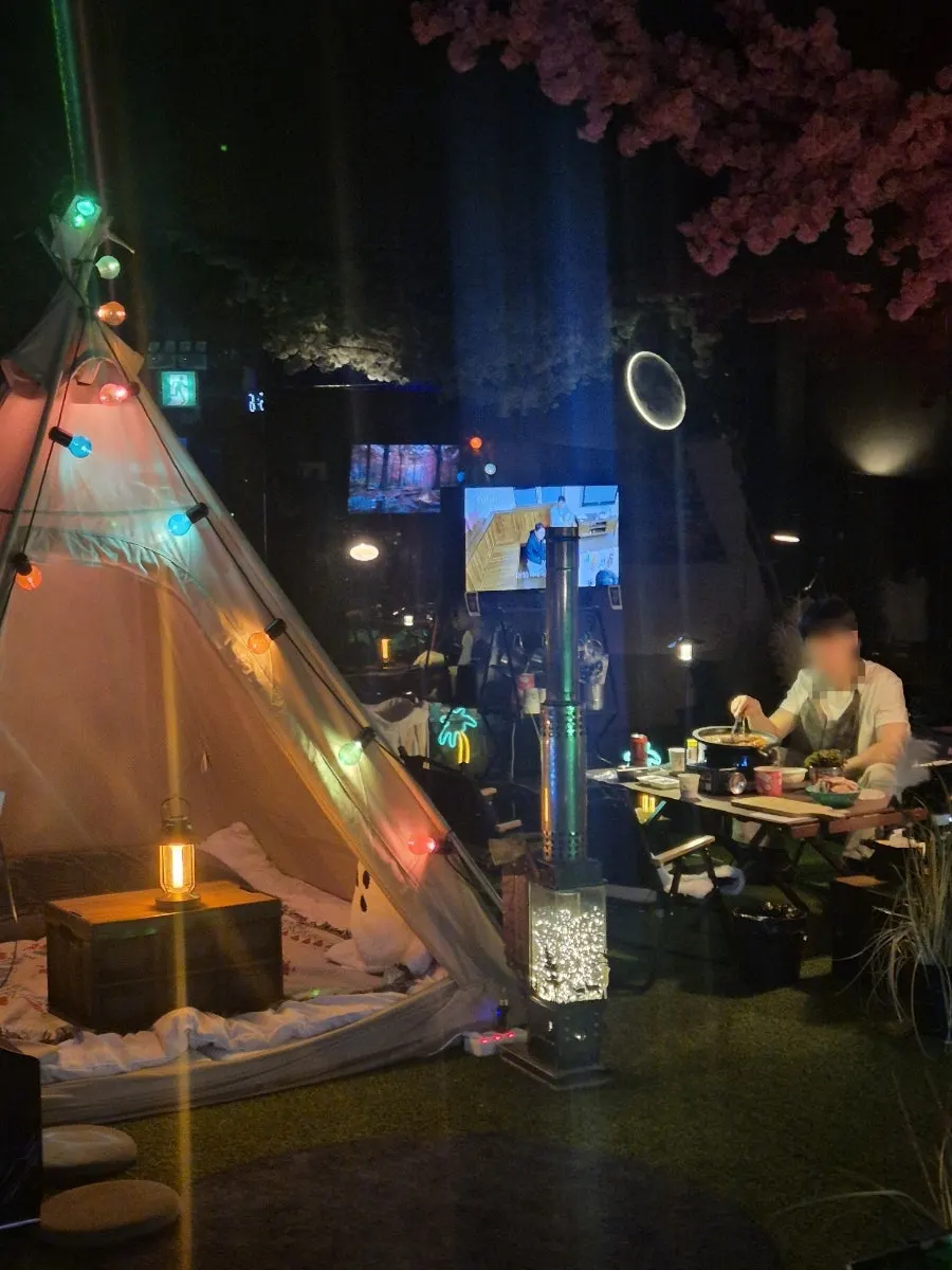 Indoor camping space for group gatherings