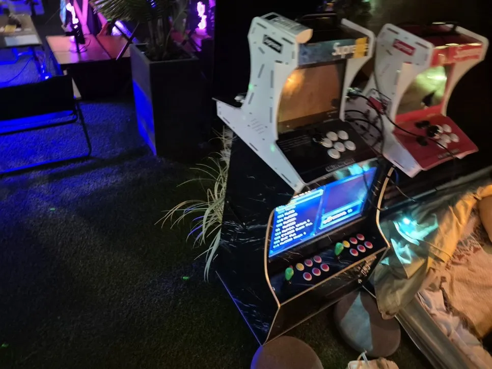 Row of retro arcade machines