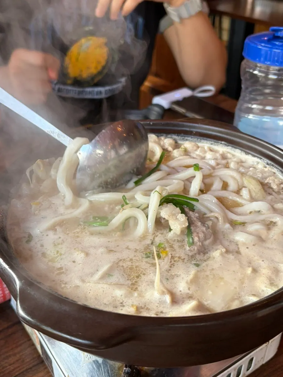 Motsunabe simmering with added udon noodles