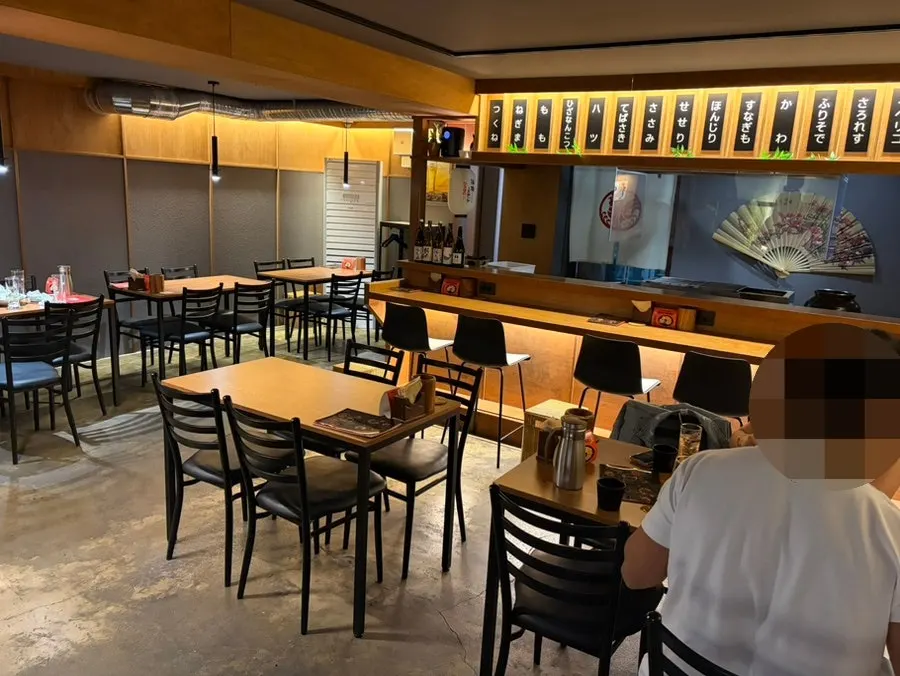 Bar counter and 4-person table seating at Yakitori Iyu