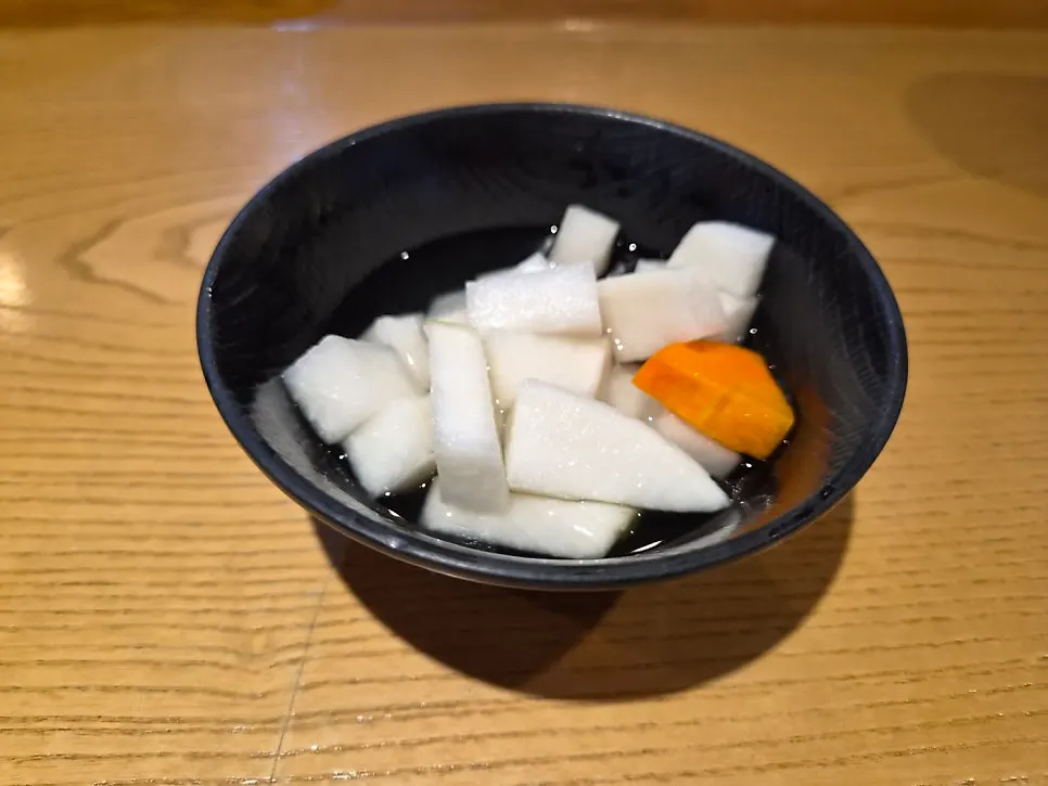 A table set with banchan before the jjimdak arrived