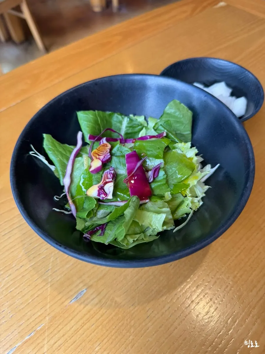 Yuzu salad and house-made radish pickles served as basic side dishes