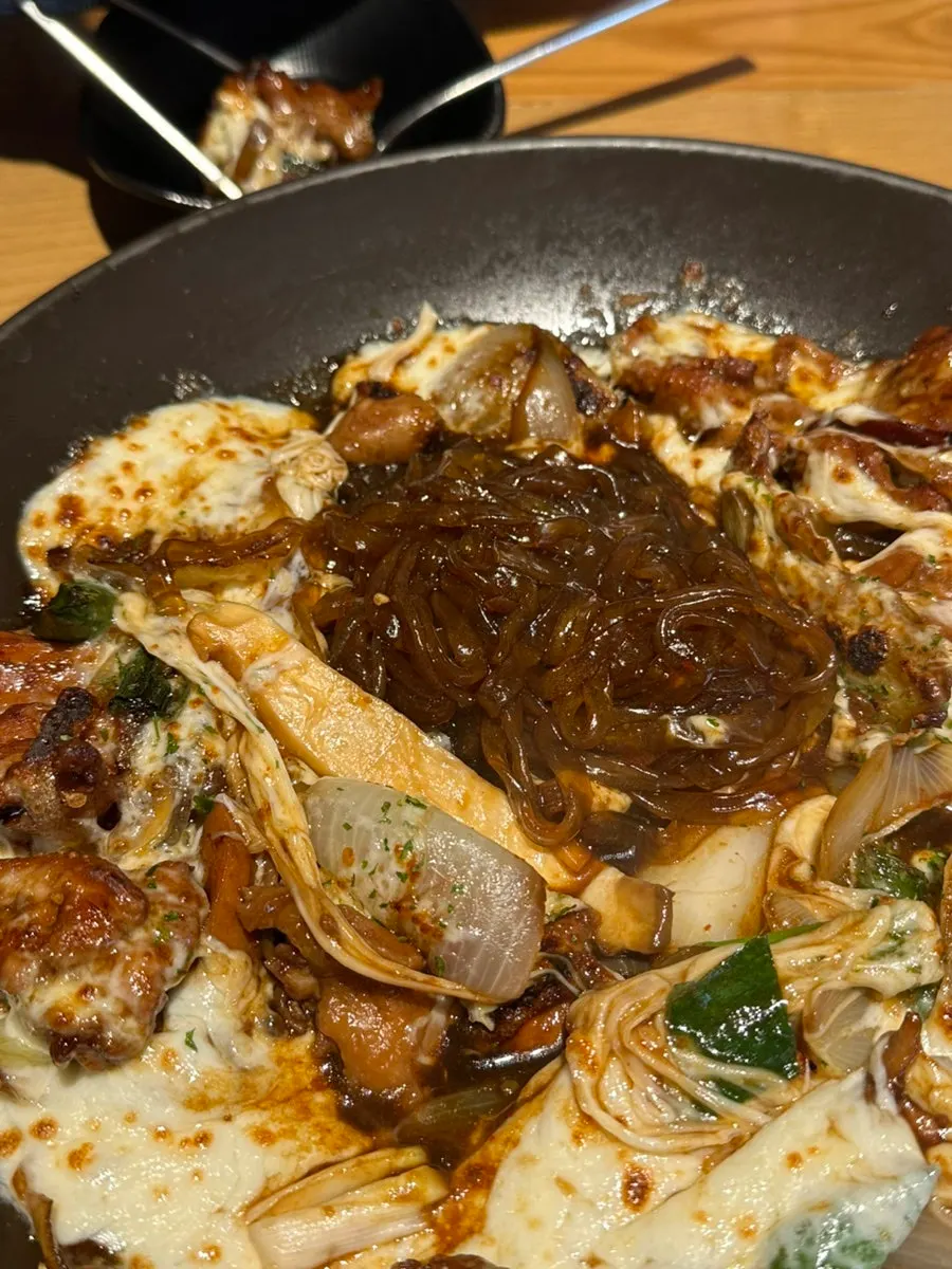 Jjimdak with potato, mushroom, and onion mixed in