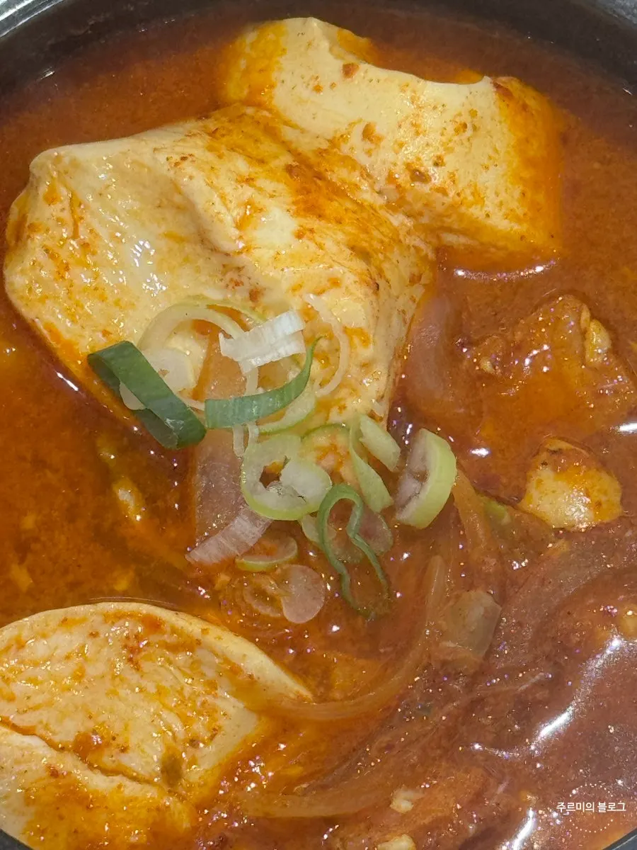 Sundubu jjageuli served over rice