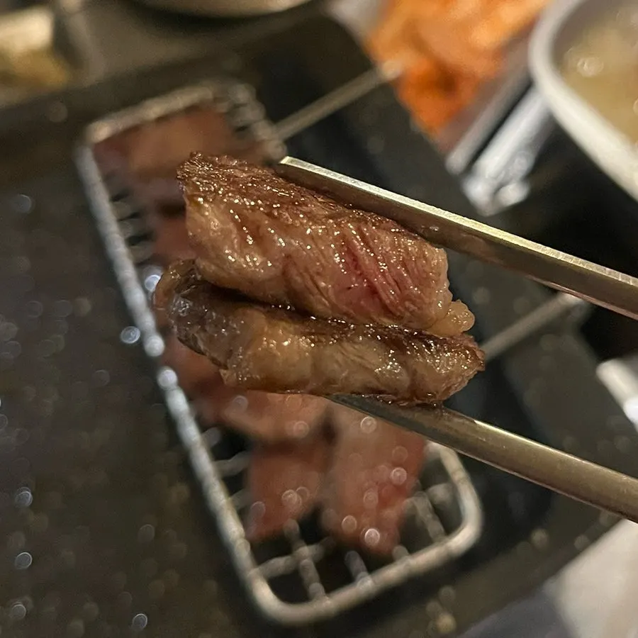 A juicy piece of grilled beef salchisal
