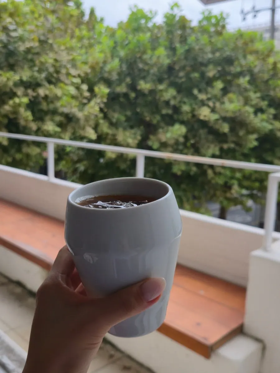 Coffee and a book at a window seat