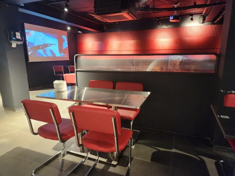 Second-floor hall decorated in red and black