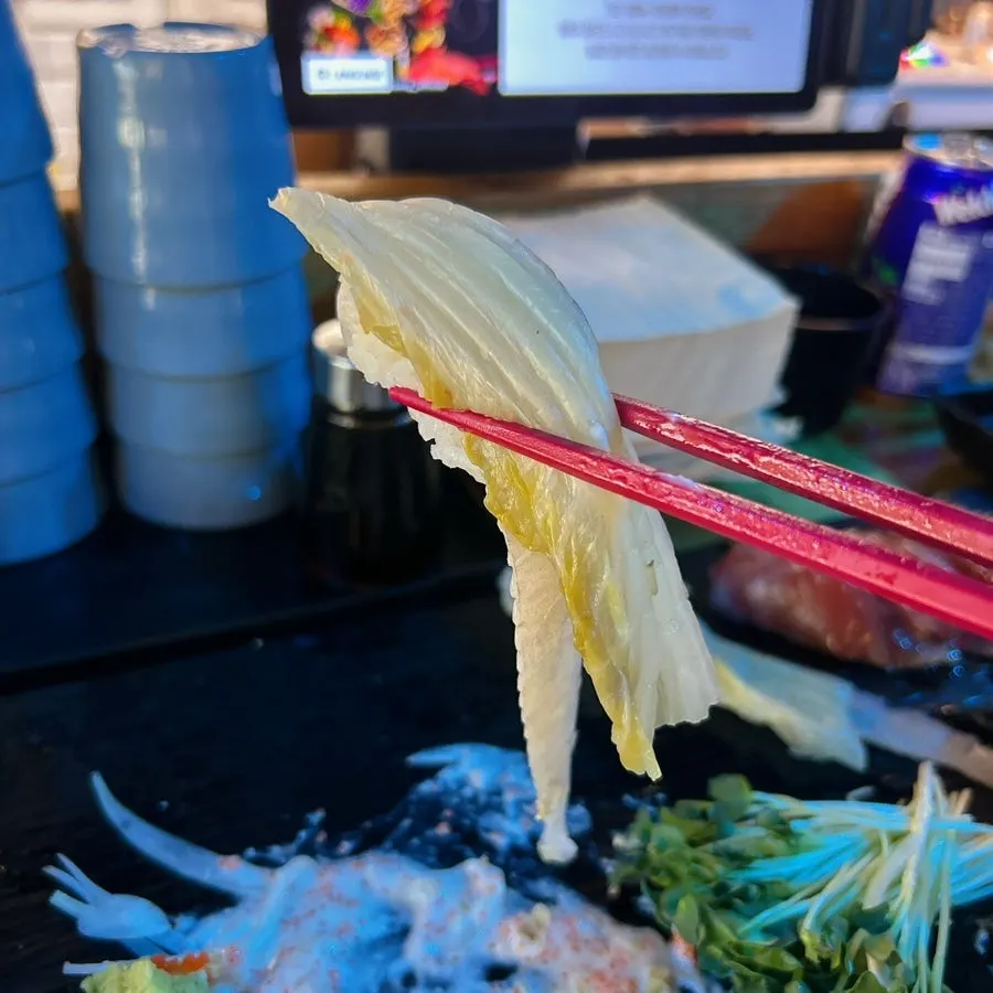 Long-tail sushi topped with flounder and salmon