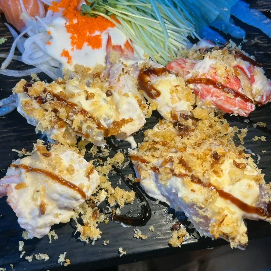 Sushi with soy sauce brushed on using a small brush