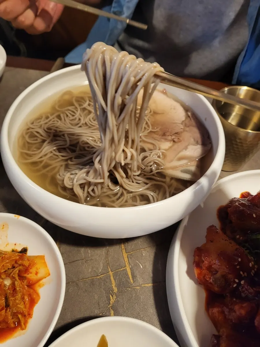 Pyongyang naengmyeon topped with suyuk