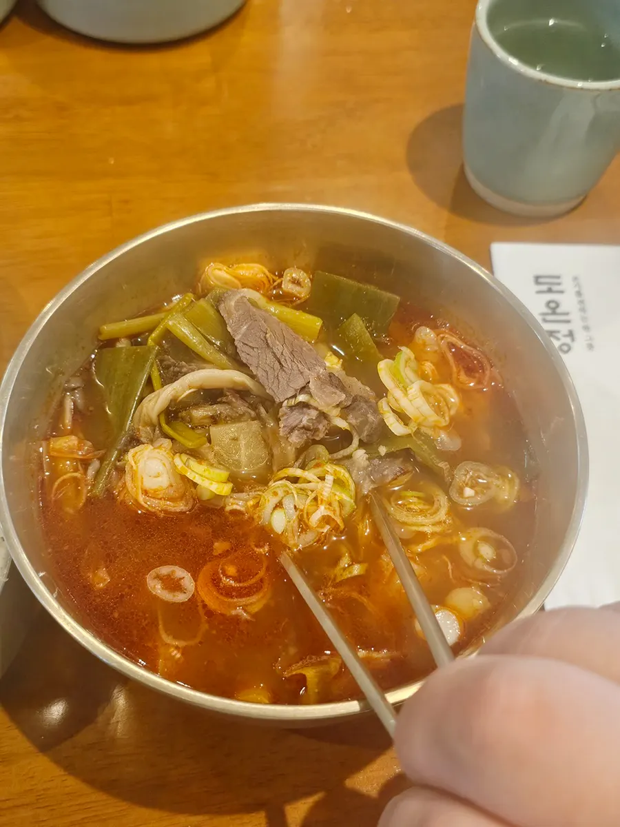Chunks of hanwoo beef in the spicy hanwoo gomtang