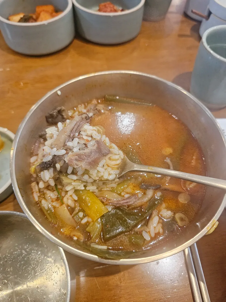 A spoonful of the spicy hanwoo gomtang broth