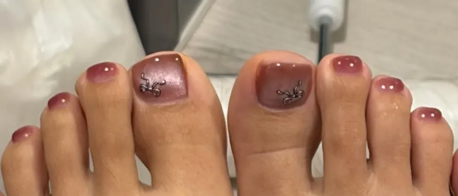 Magnetic-nail pedicure photographed at a swimming pool