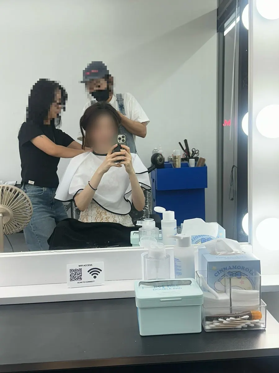 Starting the hair styling after makeup was finished