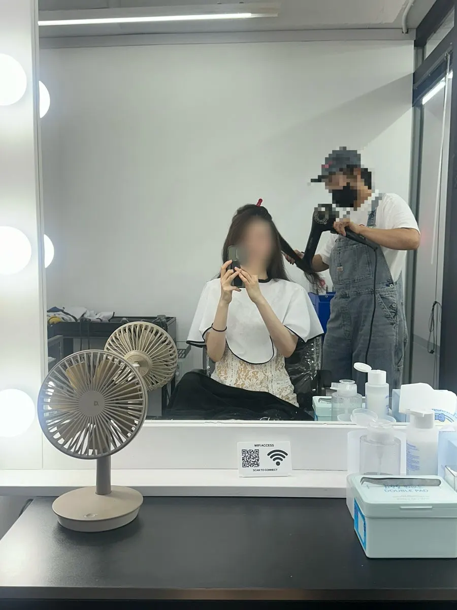 Long hair finished with bold waves