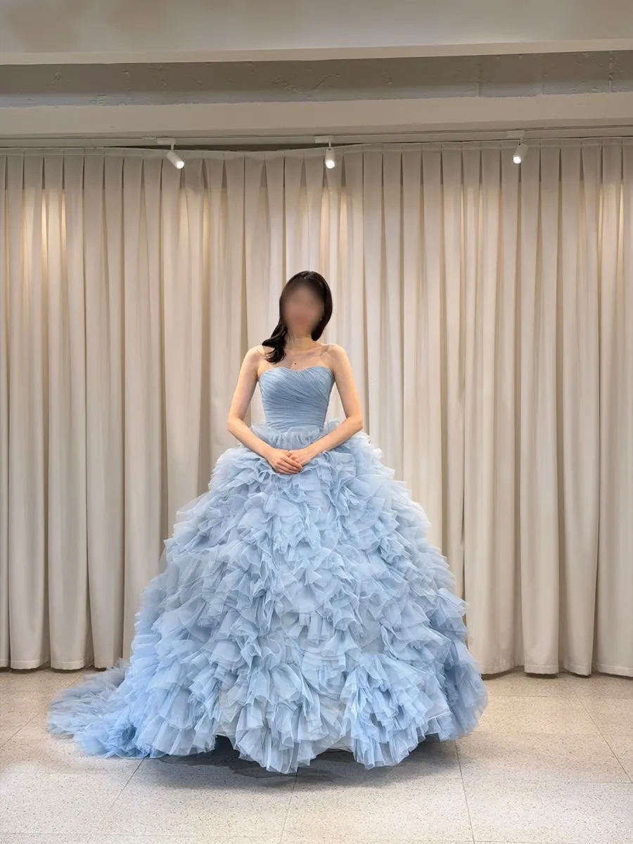 Photo wearing the dress after hair and makeup