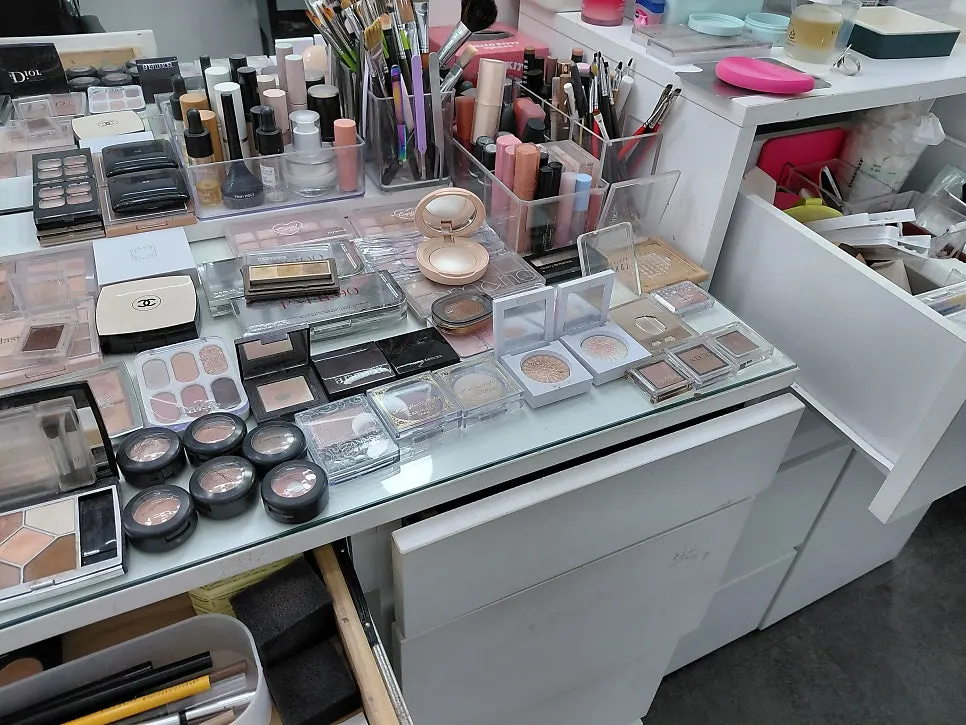 Cosmetics and brushes on display at Today Makeup