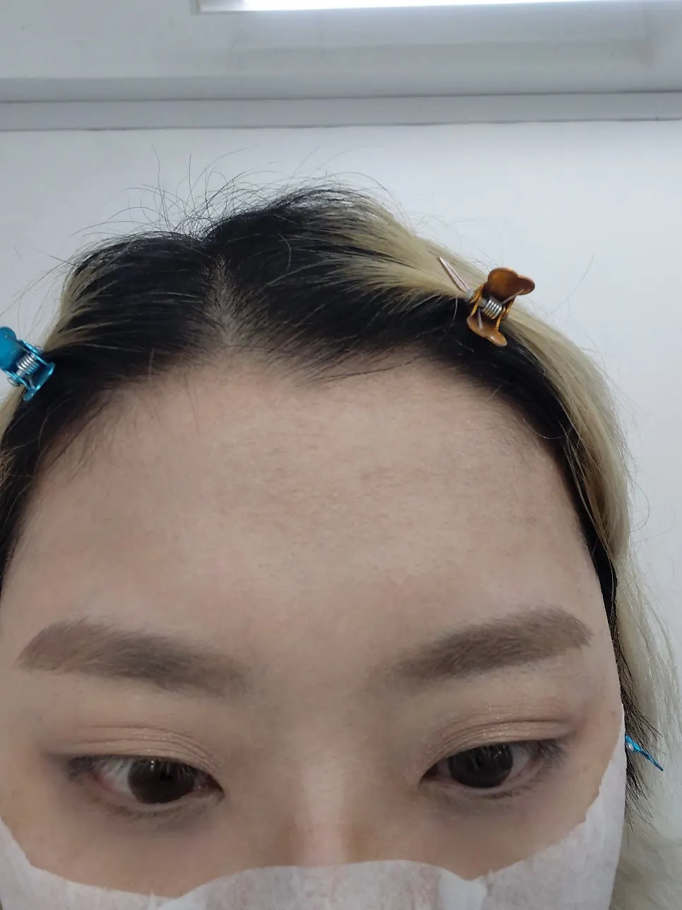 Eyebrow and eye makeup in progress