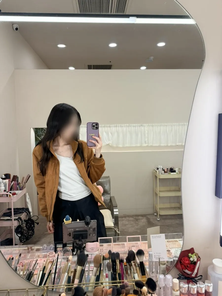 Finished makeup with blush applied