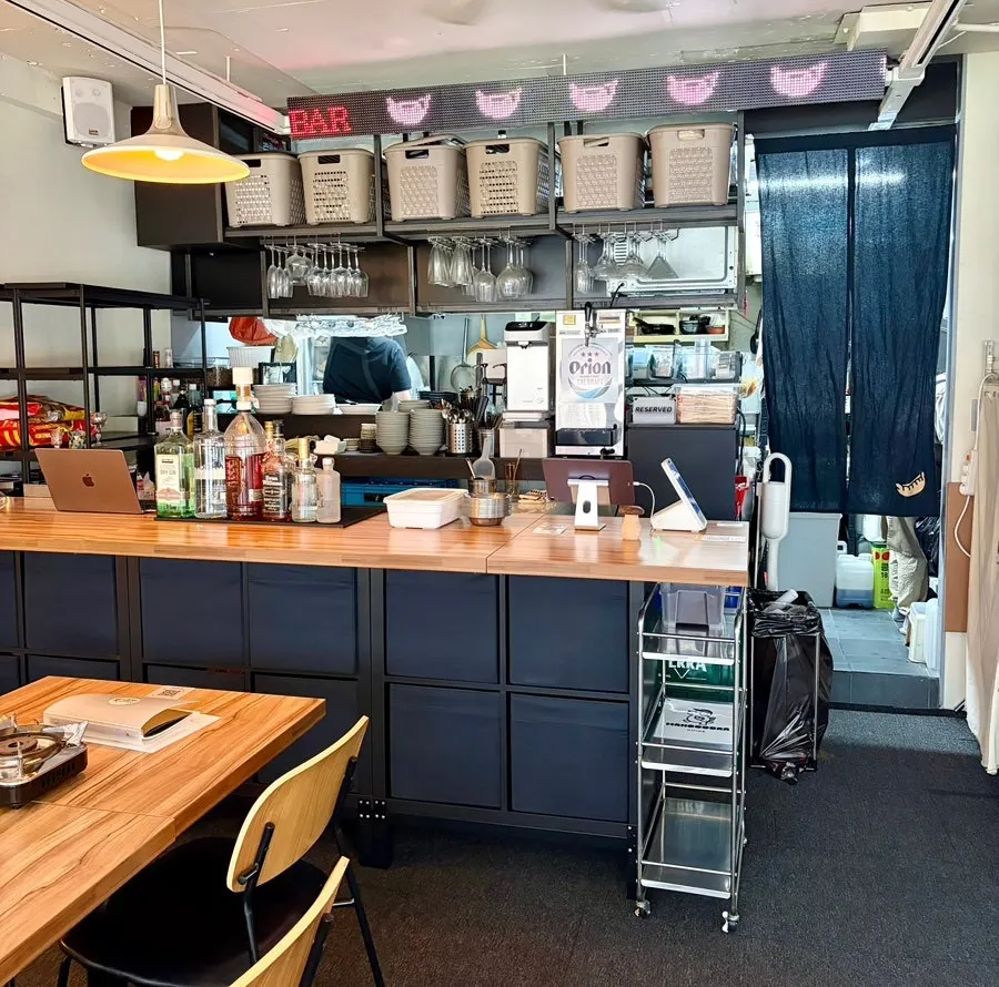 2nd-floor tables with window seating at the dumpling bar