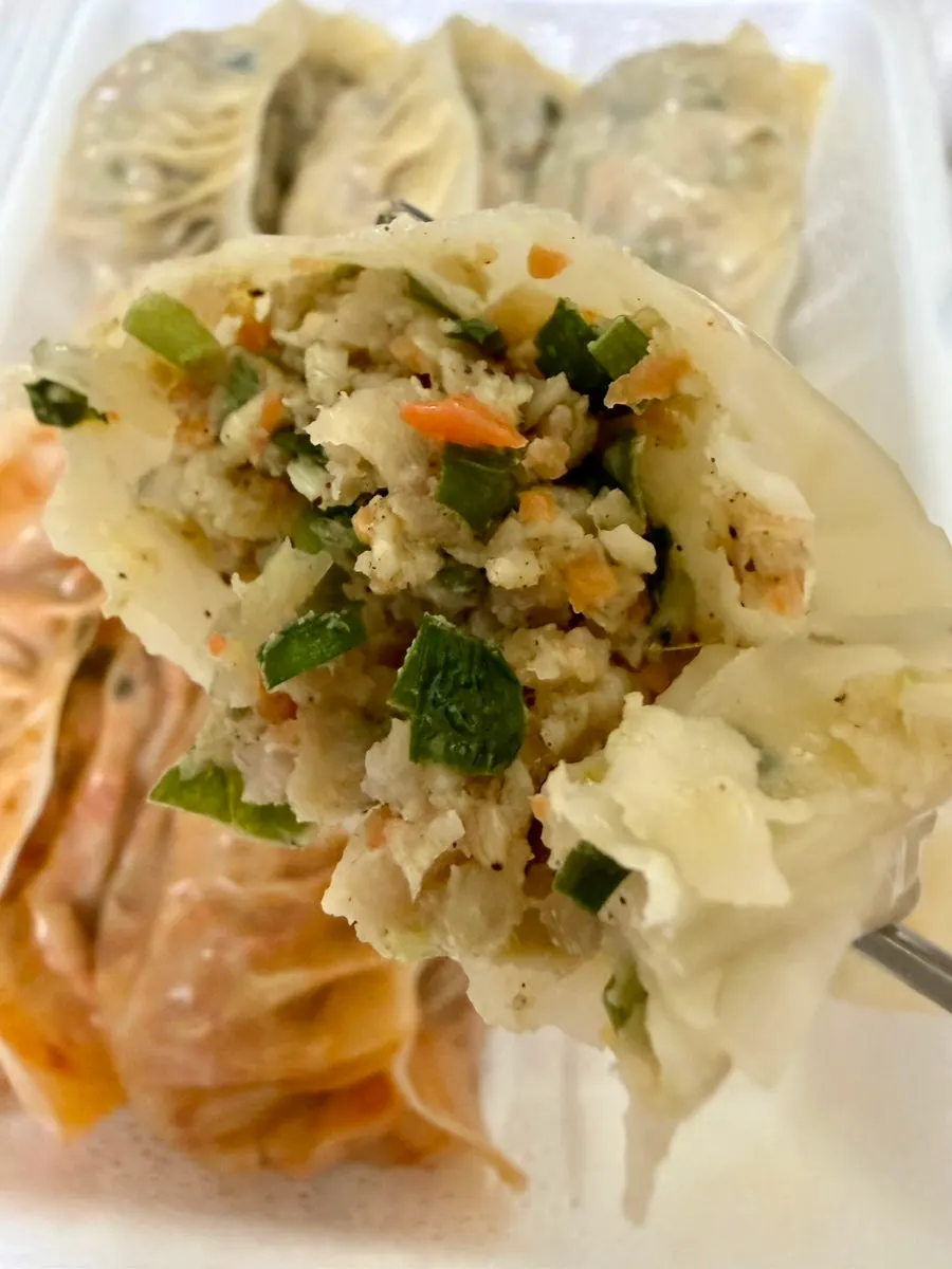 Cross-section of a steamed dumpling with a thin wrapper