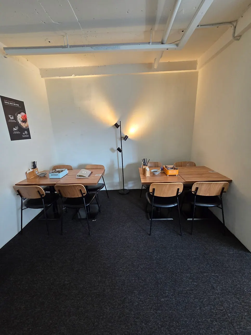A 2-person window table on MANDOO BAR's 2nd floor