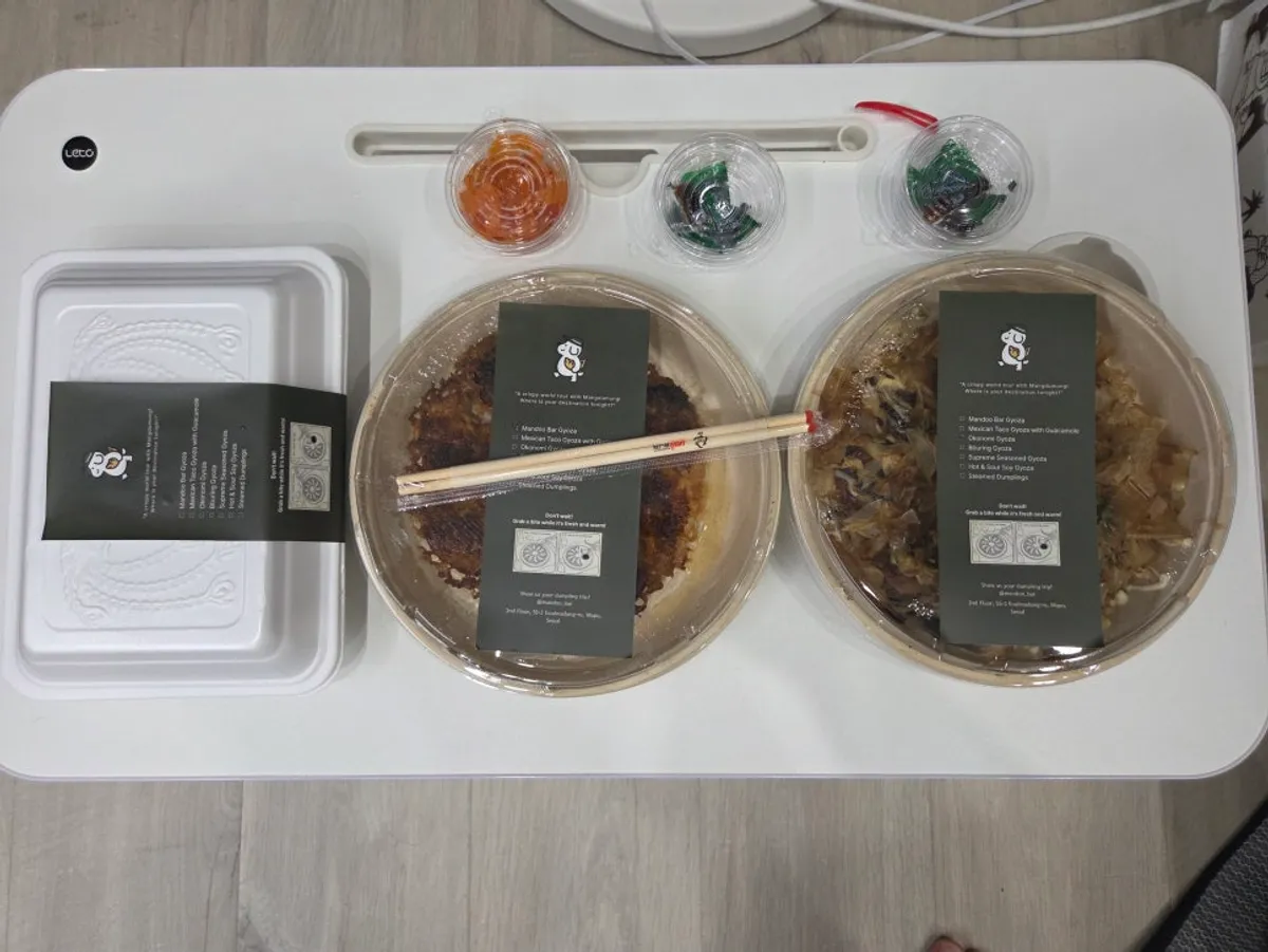 MANDOO BAR gyoza and steamed dumplings laid out at home