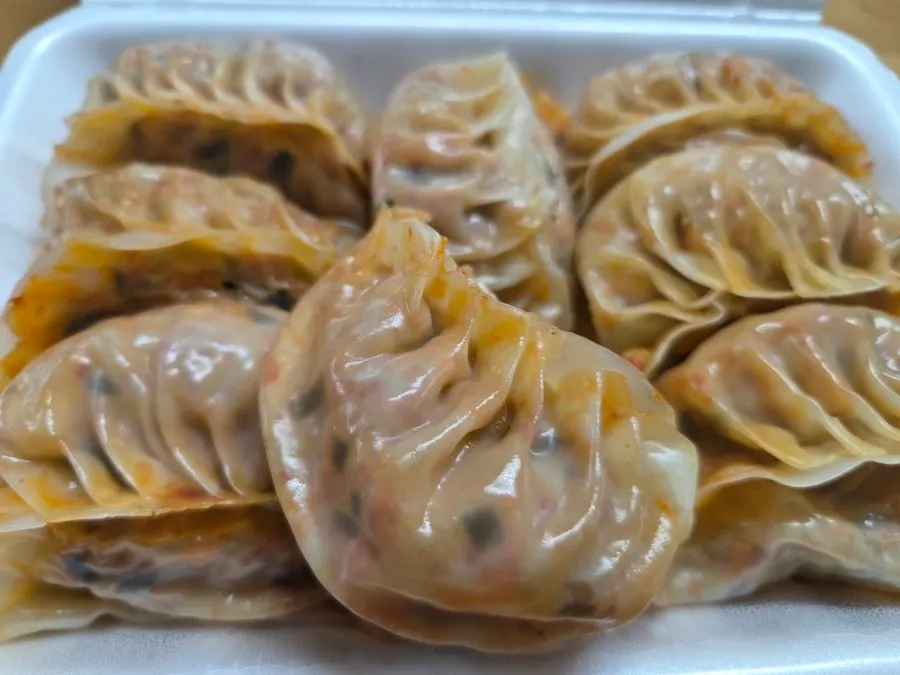 Cross-section of a meat dumpling packed full inside