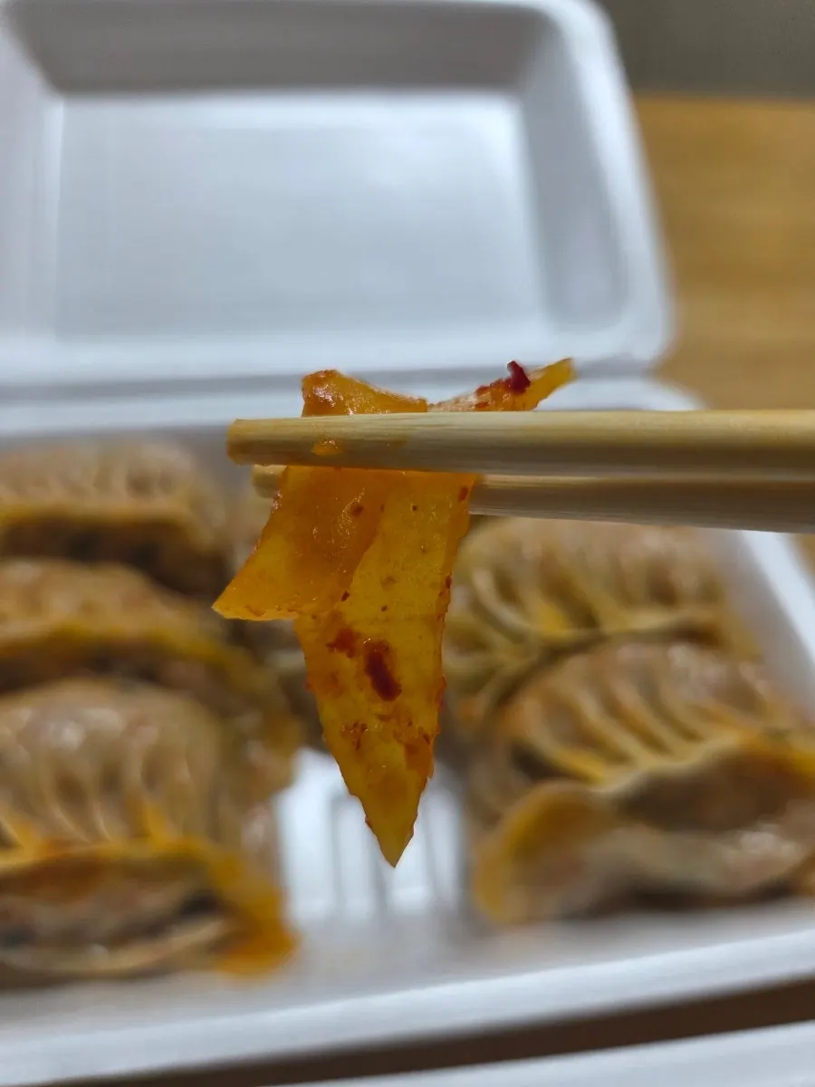 Inside of a spicy kimchi dumpling