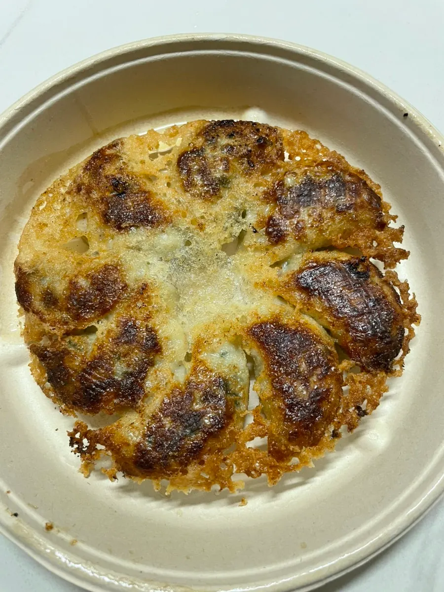 MANDOO BAR dumplings plated at home
