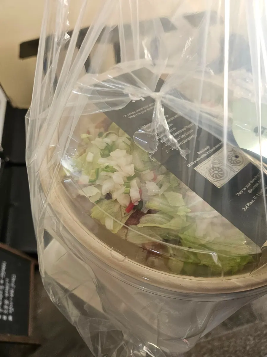 MANDOO BAR takeout bag and packaging containers