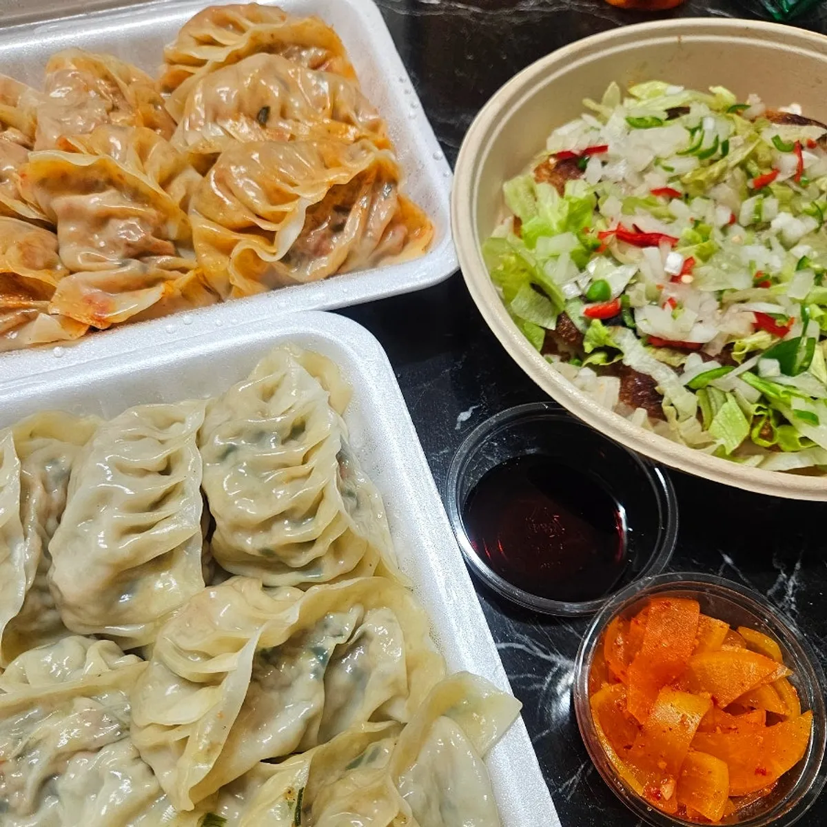 Yurinki gyoza and steamed mandu from MANDOO BAR set up at home