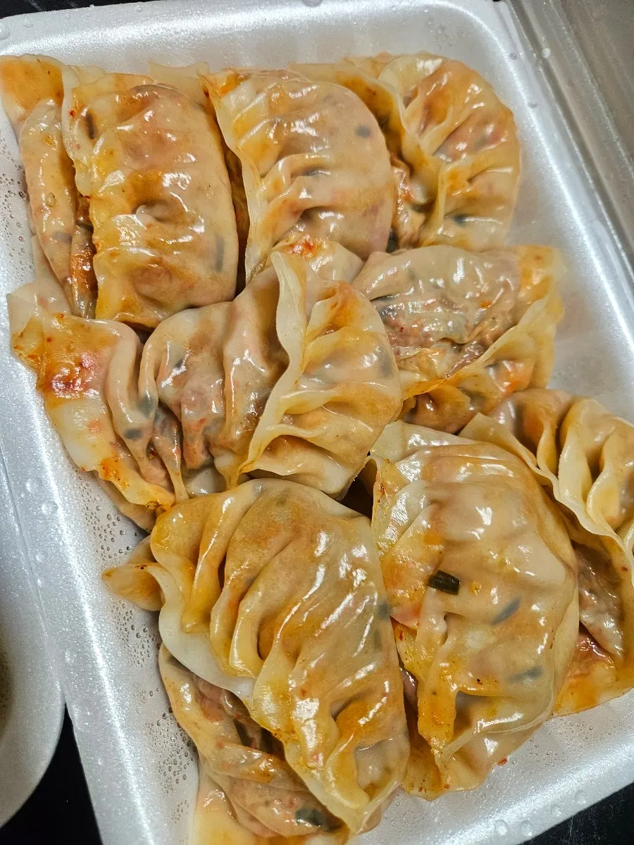 Close-up of MANDOO BAR steamed mandu