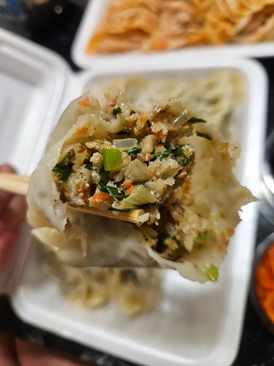 Inside of a MANDOO BAR meat mandu cut in half