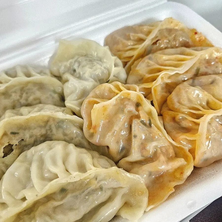 Crisp pan-fried dumplings, half meat and half kimchi