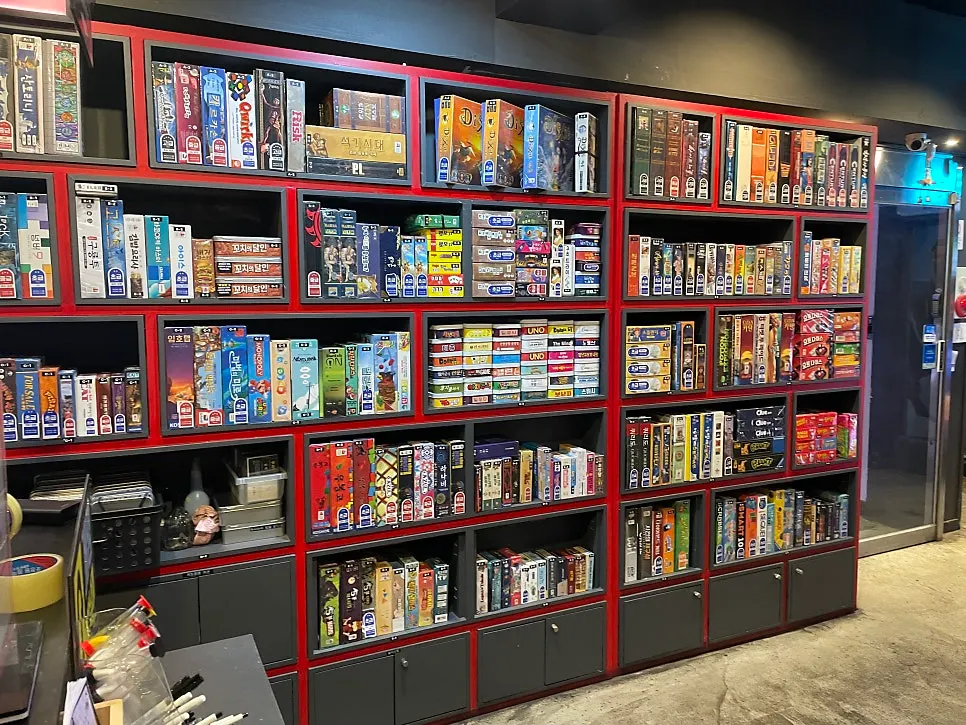 Board games extending to separate shelves