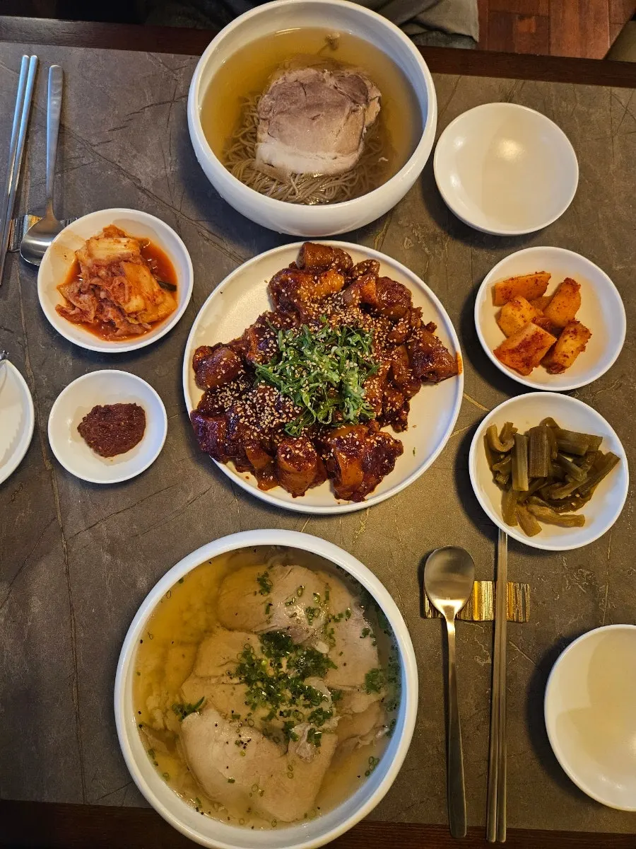 Banchan of kimchi and gungchae pickles