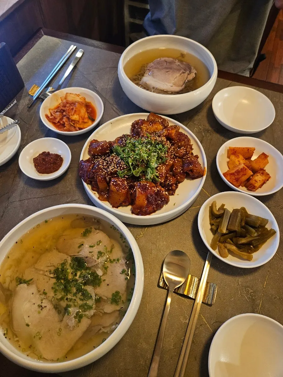 Korean side dishes served with meat sauce
