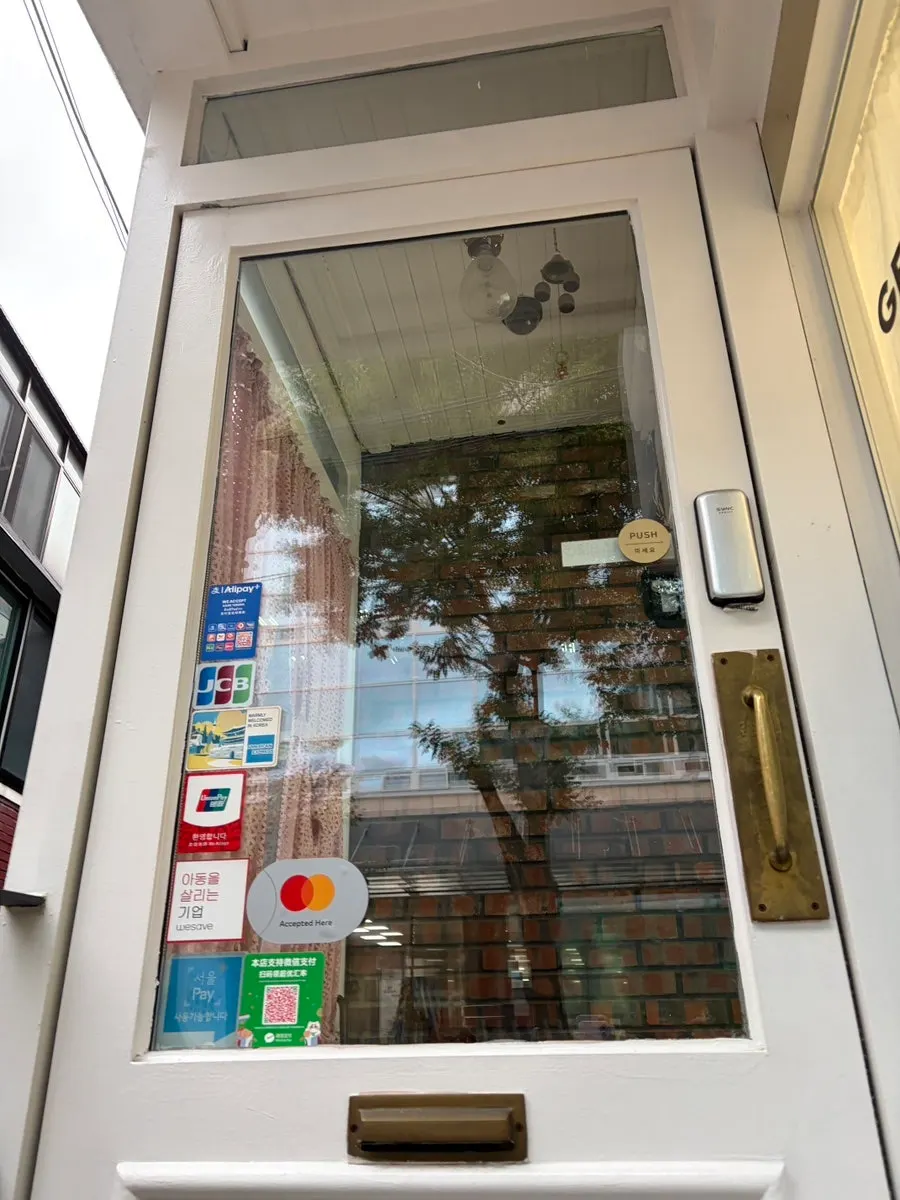 Vintage front door with a wooden handle