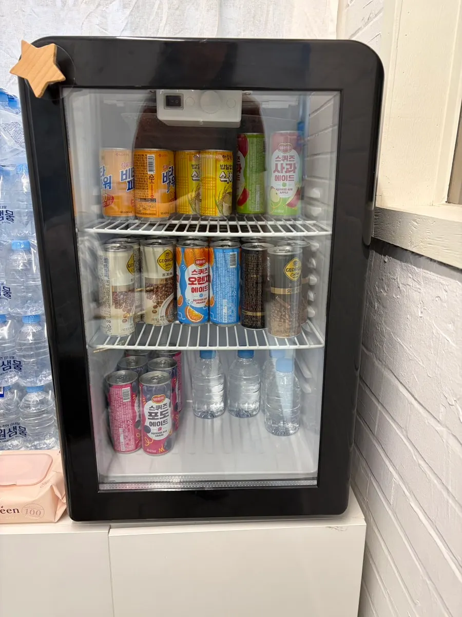 Mini fridge stocked with free drinks